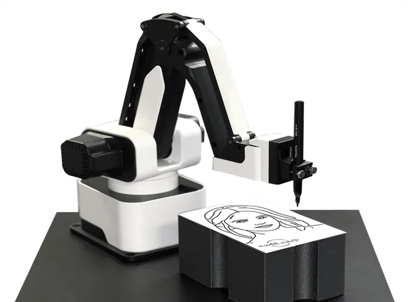 The robotic arm part-way through drawing a portrait